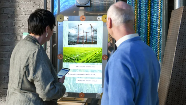 Präsentation des Aquarius Mülheim auf einem Bildschirm.