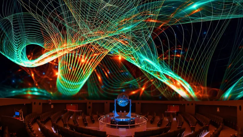 Innenansicht des Planetariums Bochum mit Blick auf die kuppelförmige Projektionsfläche und Sitzreihen.